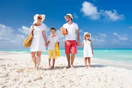 Family on a tropical beach vacation
