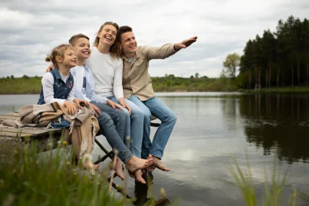 full-shot-happy-family-outdoors_23-2148996630
